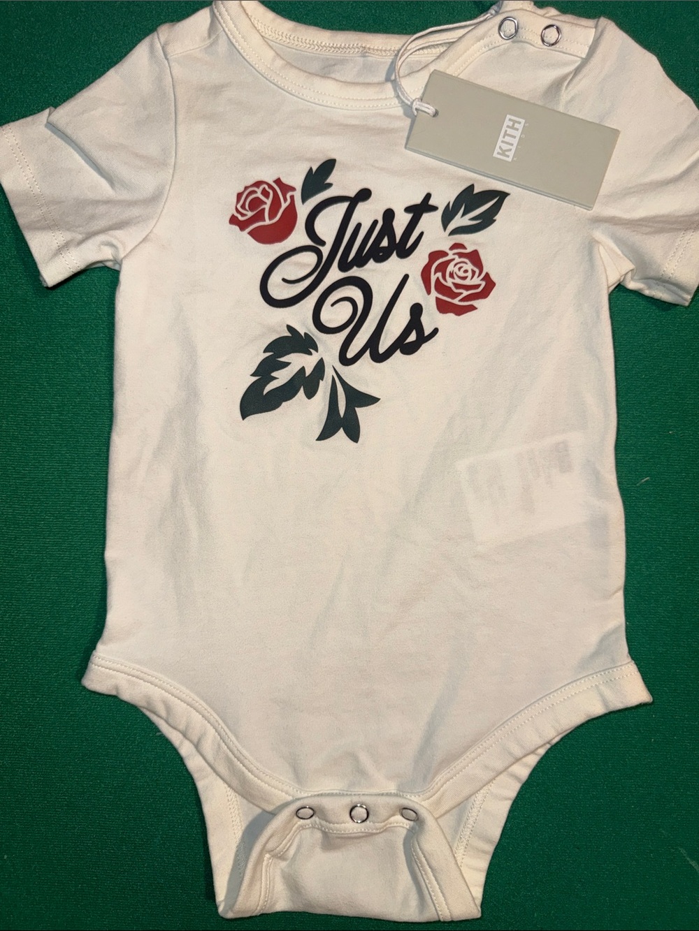 Kith White One-Piece Bodysuit with Red Rose and Black Script